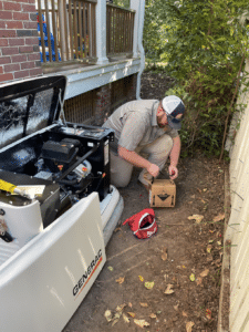 technician installing generator