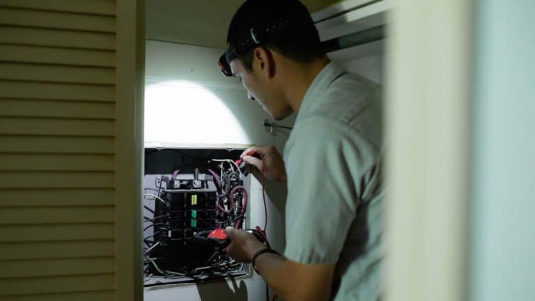 electrician doing work on an electrical panel