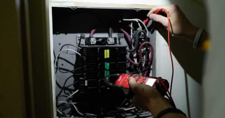 electrician working on a panel
